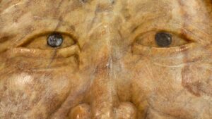 Close up of eyes in Abraham Ruben Anghik's sculpture entitled Head